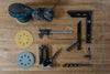Essential woodworking tools arranged on a wooden workbench